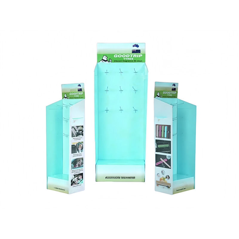 Does a corrugated cardboard display stand with peg hooks support a multi-layer hanging layout?